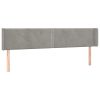 Hoofdbord met randen 163x16x78/88 cm fluweel lichtgrijs