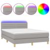 Boxspring met matras en LED stof lichtgrijs 140x200 cm