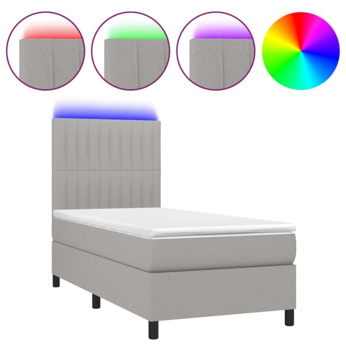 Boxspring met matras en LED stof lichtgrijs 90x200 cm